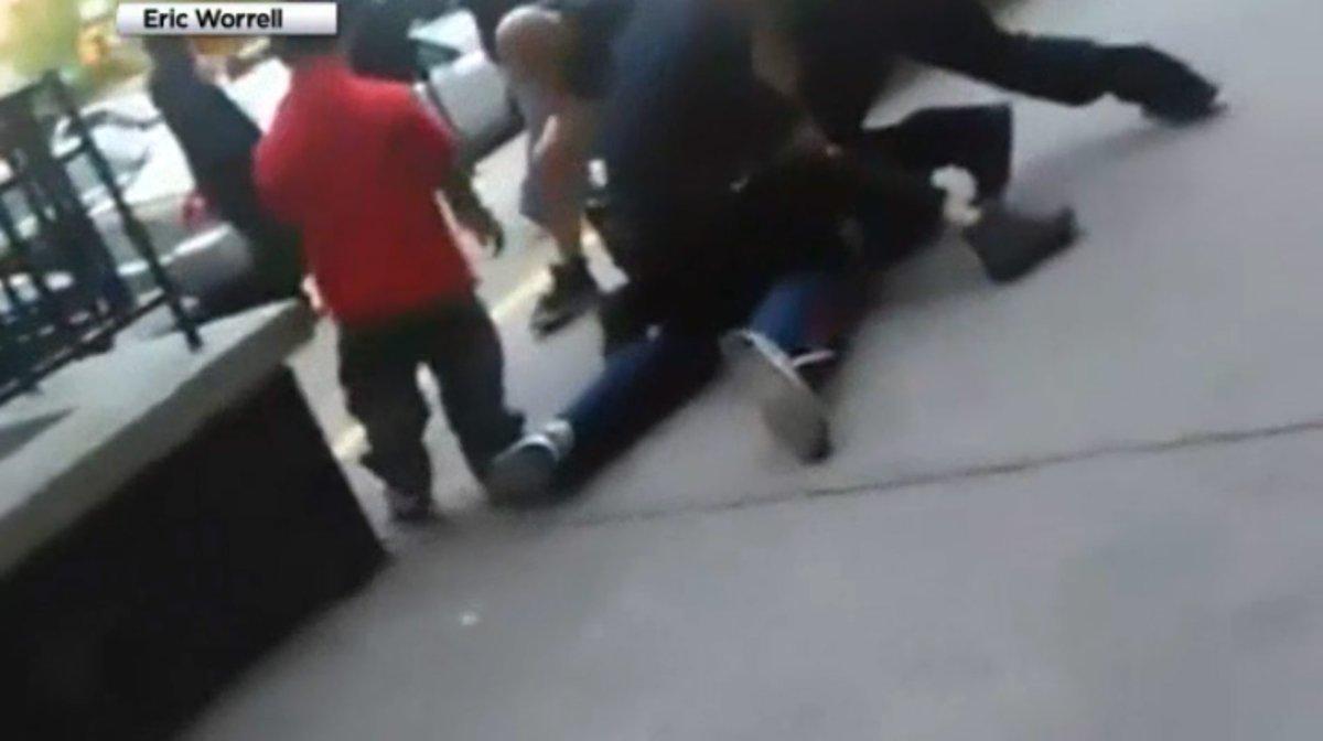 nypd punches harlem bystander