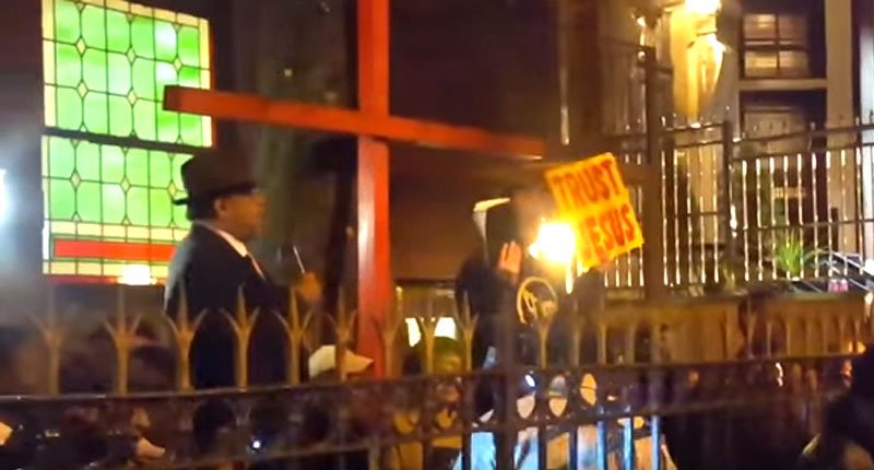 Pastor-James-David-Manning-and-his-supporters-outside-the-church-Screenshot-800x430