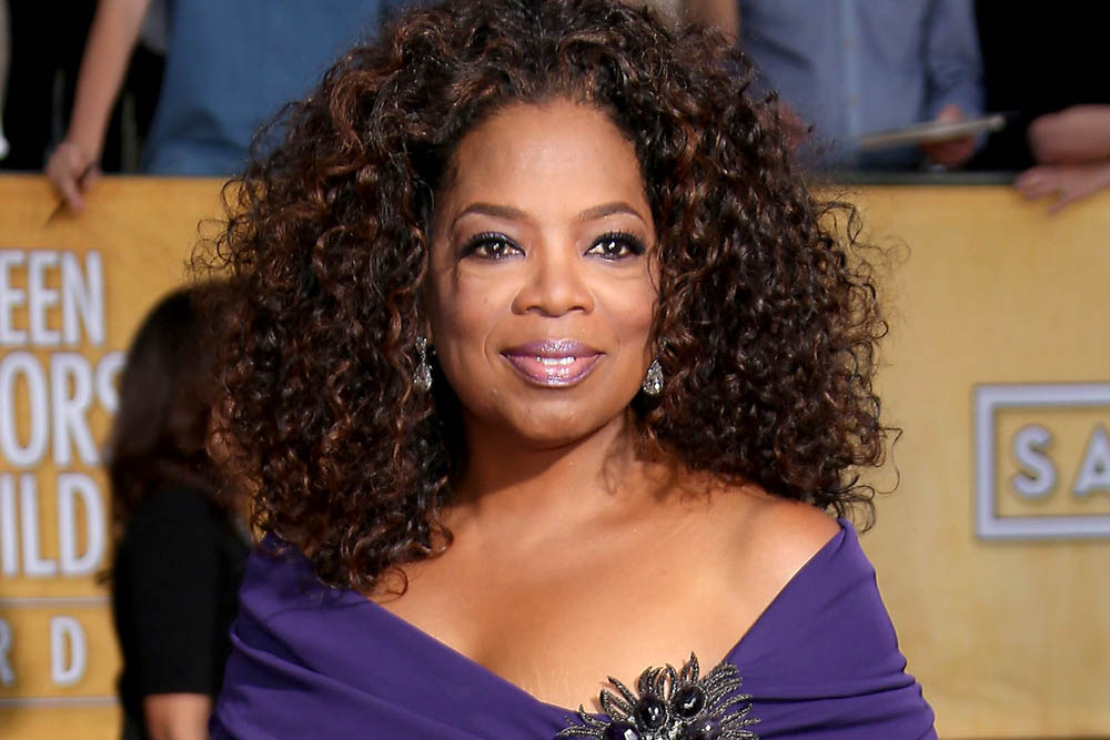 LOS ANGELES, CA - JANUARY 18: Oprah Winfrey arrives at the 20th Annual Screen Actors Guild Awards at the Shrine Auditorium on January 18, 2014 in Los Angeles, California. (Photo by Dan MacMedan/WireImage)