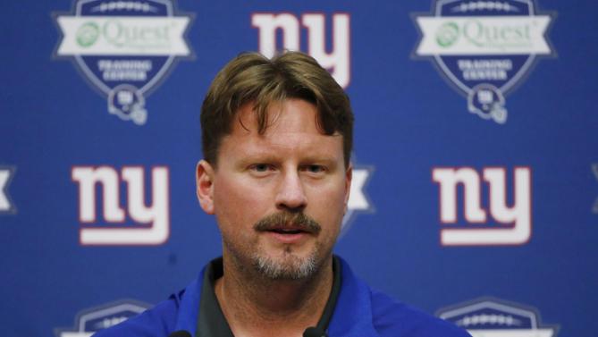 FILE - In this June 18, 2015, file photo, New York Giants offensive coordinator Ben McAdoo talks to reporters during NFL football minicamp in East Rutherford, N.J. A person familiar with the decision tells The Associated Press the Giants are hiring offensive coordinator Ben McAdoo as their next head coach. McAdoo, 38, is being given the job a little more than a week after Tom Coughlin stepped down after 12 seasons, the person spoke Wednesday on condition of anonymity because the team has not officially announced the hiring. (AP Photo/Julio Cortez, File)